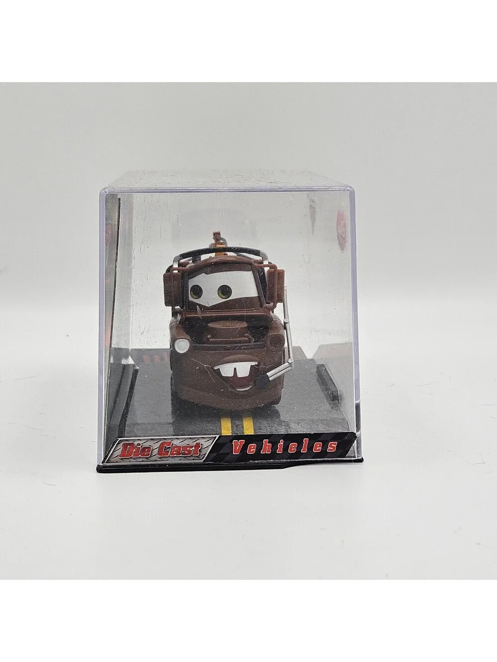 Disney Store Cars Mater Diecast Vehicle w/ Display Case Pixar